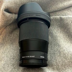 16mm 1:4 sigma lens for sony cameras. Only used three times. Great bokeh!